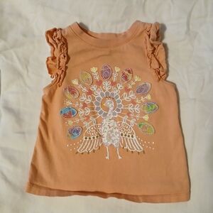 First Impressions Peach Ruffle Tank with Colorful Peacock Graphic